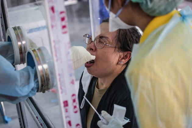 April 27, 2020, Bangkok, Thailand: Medical health workers at Mongkutwattana General Hospital wear protective gears as a precaution while screening a patient suspected to be infected with the covid-19 Coronavirus during lab examination..Coronavirus disease (COVID-19) is an infectious disease caused by a newly discovered coronavirus. the virus that causes COVID-19 is mainly transmitted through droplets generated when an infected person coughs, sneezes, or exhales, these droplets are too heavy to hang in the air, and quickly fall on floors or surfaces. Bangkok Thailand - ZUMAs197 20200427_zaa_s197_018 Copyright: xPrawetxPuengsawangpholx