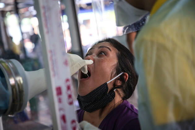 April 27, 2020, Bangkok, Thailand: A medical health worker at Mongkutwattana General Hospital wears a protective gear as a precaution while screening a patient suspected to be infected with the covid-19 Coronavirus during lab examination..Coronavirus disease (COVID-19) is an infectious disease caused by a newly discovered coronavirus. the virus that causes COVID-19 is mainly transmitted through droplets generated when an infected person coughs, sneezes, or exhales, these droplets are too heavy to hang in the air, and quickly fall on floors or surfaces. Bangkok Thailand - ZUMAs197 20200427_zaa_s197_026 Copyright: xPrawetxPuengsawangpholx