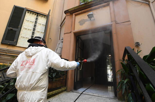 (200427) -- ROME, April 27, 2020 (Xinhua) -- A worker of a disinfection company disinfects the surroundings of a residential building amid the coronavirus pandemic in Rome, Italy, April 27, 2020. (Photo by Alberto Lingria Xinhua) ITALY-ROME-COVID-19-DISINFECTION 