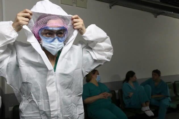 MOSCOW, RUSSIA - APRIL 27, 2020: A medical worker after a shift at the COVID-19 treatment facility at Pirogov City Clinical Hospital 1. The facility treats COVID-19 patients, patients with suspected coronavirus and patients with viral community-acquired pneumonia. Sergei Karpukhin TASS  TS0D73B5