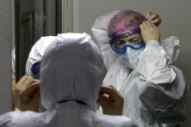 MOSCOW, RUSSIA - APRIL 27, 2020: Medical workers ahead of a shift at the COVID-19 treatment facility at Pirogov City Clinical Hospital 1. The facility treats COVID-19 patients, patients with suspected coronavirus and patients with viral community-acquired pneumonia. Sergei Karpukhin TASS  TS0D7400