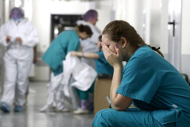 MOSCOW, RUSSIA - APRIL 27, 2020: A nurse ahead of a shift at the COVID-19 treatment facility at Pirogov City Clinical Hospital 1. The facility treats COVID-19 patients, patients with suspected coronavirus and patients with viral community-acquired pneumonia. Sergei Karpukhin TASS  TS0D73FE
