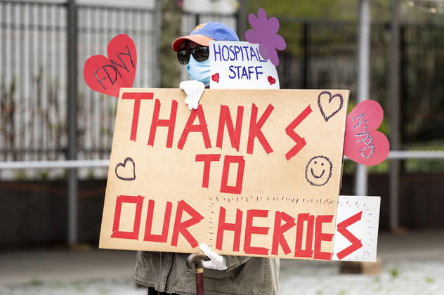 April 27, 2020, New York, NY, U.S: April 27, 2020 - New York, NY, United States: Someone hold a sign thanking the New York City Firemen and people from Mount Sinai Morningside hospital at the corner of West 113th Street and Amsterdam Avenue and other frontline and essential workers facing the Coronavirus. New York U.S. - ZUMAb161 20200427_zap_b161_003 Copyright: xMichaelxBrochsteinx