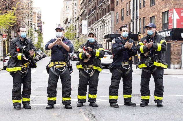 April 27, 2020, New York, NY, U.S: April 27, 2020 - New York, NY, United States: New York City Firemen at the corner of West 113th Street and Amsterdam Avenue clapping and cheering at 7:00pm for frontline and essential workers facing the Coronavirus. New York U.S. - ZUMAb161 20200427_zap_b161_005 Copyright: xMichaelxBrochsteinx