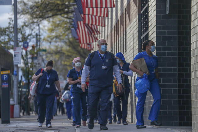 April 27, 2020, New York, NY, USA: The evening shift of nurses, doctors and other medical workers arrive at Elmhurst Hospital in Queens, New York City to treat COVID-19 and novel Coronavirus patients. New York USA - ZUMAh16_ 20200427_zaf_h16_006 Copyright: xDanxHerrickx