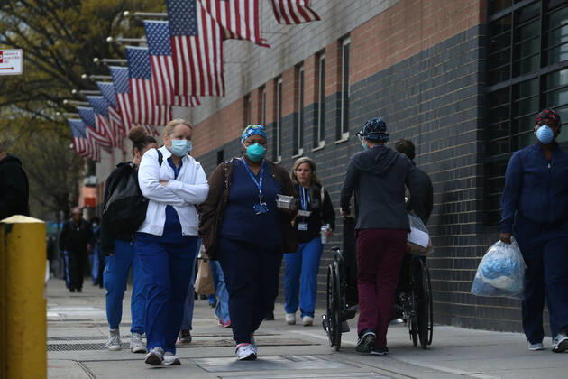 April 27, 2020, New York, NY, USA: The evening shift of nurses, doctors and other medical workers arrive at Elmhurst Hospital in Queens, New York City to treat COVID-19 and novel Coronavirus patients. New York USA - ZUMAh16_ 20200427_zaf_h16_016 Copyright: xDanxHerrickx