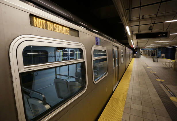 (200427) -- VANCOUVER, April 27, 2020 (Xinhua) -- A not-in-service train is seen inside a Skytrain station in Vancouver, Canada, April 27, 2020. Metro Vancouver s transportation authority TransLink announced on Monday that it is laying off 1,492 workers with further reduction in services due to the massive downturn in ridership during the COVID-19 pandemic. As of Monday afternoon, there were 48,230 confirmed COVID-19 cases in Canada and 2,701 deaths. (Photo by Liang Sen Xinhua) CANADA-VANCOUVER-COVID-19-JOB CUTS 