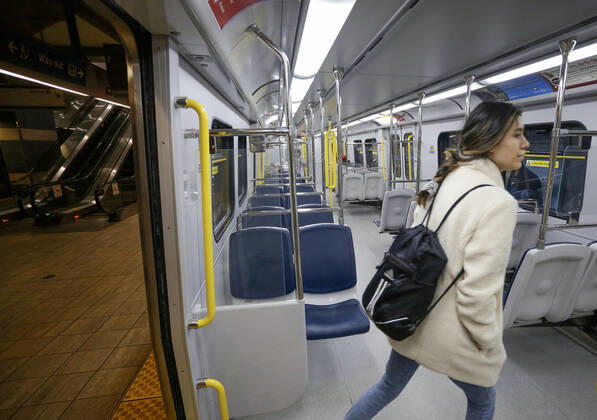 (200427) -- VANCOUVER, April 27, 2020 (Xinhua) -- A passenger walks into an empty train at a Skytrain station in Vancouver, Canada, April 27, 2020. Metro Vancouver s transportation authority TransLink announced on Monday that it is laying off 1,492 workers with further reduction in services due to the massive downturn in ridership during the COVID-19 pandemic. As of Monday afternoon, there were 48,230 confirmed COVID-19 cases in Canada and 2,701 deaths. (Photo by Liang Sen Xinhua) CANADA-VANCOUVER-COVID-19-JOB CUTS 