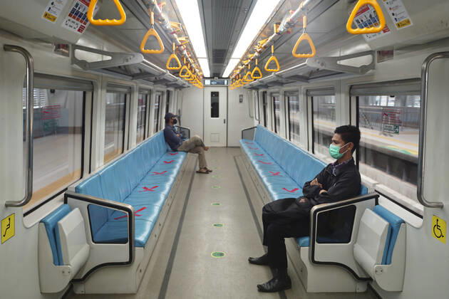 April 28, 2020, Palembang, South Sumatra, Indonesia: April 28, 2020 : Palembang,South Sumatra, Indonesia : People sit on designated areas decided by red cross marks to ensure social distancing inside a light rapid transit train in Palembang, South Sumatra on April 28, 2020.The Indonesian government has closed mall , tourists destinations and urged citizens to avoid public gatherings, including religious activities as a precautionary measure against the spread of coronavirus. Zuma Wire Palembang Indonesia - ZUMAz115 20200428_zip_z115_013 Copyright: xALxZulkiflix