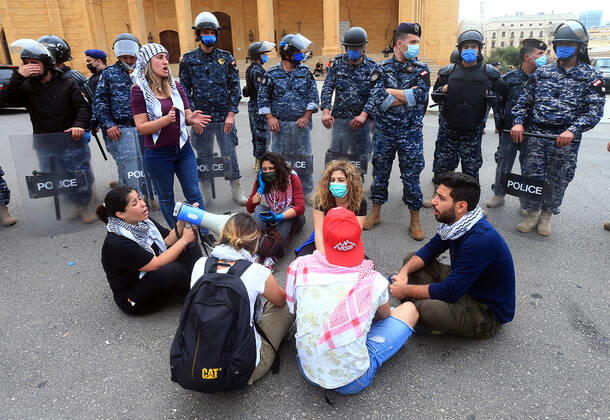 April 27, 2020, Beirut, Beirut, Lebanon: Lebanese protesters Anti-government, some wearing masks as a precaution against the spread of the coronavirus disease (COVID-19), shout slogans as they march during a protest against the Lebanese central bank s governor Riad Salameh and against the deepening financial crisis, in Beirut, Lebanon, April 27, 2020. Lebanon s currency continued its downward spiral against the dollar, reaching a new low amid financial turmoil in the crisis-hit country compounded by the coronavirus outbreak Beirut Lebanon - ZUMAap3_ 20200427_zaf_ap3_206 Copyright: xHaithamxAl-Mousawix