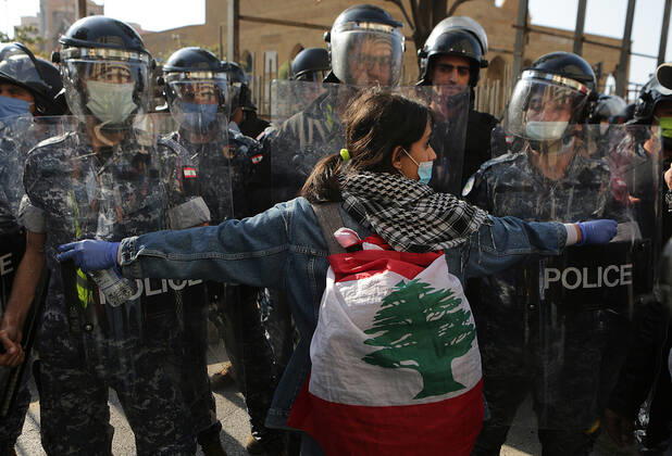 April 28, 2020, Beirut, Beirut, Lebanon: A lebanese protester Anti-government during a protest against growing economic hardship in Beirut, Lebanon April 28, 2020. Hundreds of protesters in Lebanon s northern city of Tripoli set fire to two banks and hurled stones at soldiers, who responded with tear gas and batons in renewed clashes triggered by an economic crisis spiraling out of control amid a weeks-long virus lockdown Beirut Lebanon - ZUMAap3_ 20200428_zaf_ap3_144 Copyright: xMarwanxBouxHaidarx