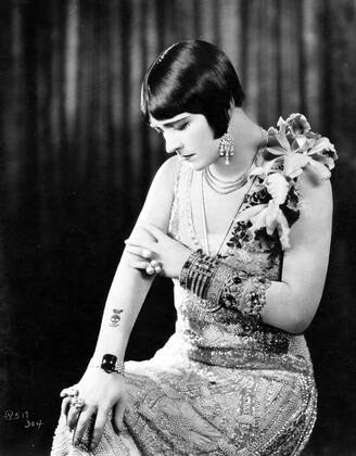 POLA NEGRI b. 31.12.1894 d. 1.8.1987 tattoo-corsage-jewellery-pearl encrusted dress. Strictly editorial use only in conjunction with the promotion of the film. Credit line mandatory. This image is copyright of the film company and is supplied under the terms of issue as film still. No commercial or book cover use permitted without prior consent from the film company.  Mandatory credit line: Image courtesy Ronald Grant Archive Mary Evans