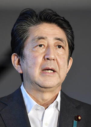 Japan PM Abe Japanese Prime Minister Shinzo Abe speaks to reporters at his office in Tokyo on July 31, 2020.