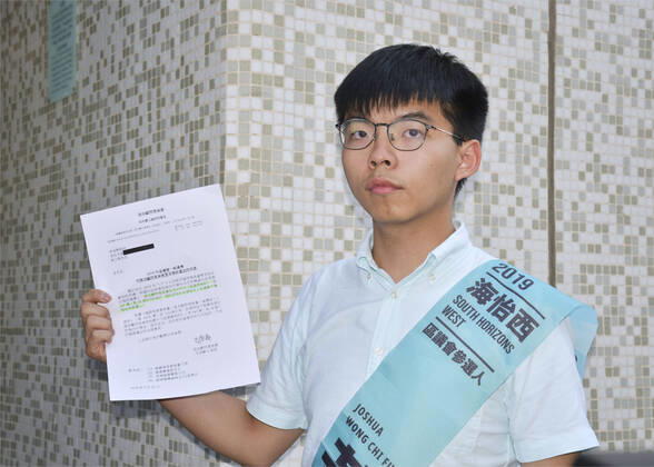 Hong Kong pro-democracy activist Joshua Wong Photo taken in Hong Kong on Oct. 4, 2019, shows pro-democracy activist Joshua Wong before filing his candidacy for the District Council election. 