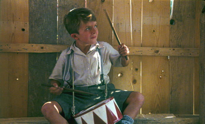 DIE BLECHTROMMEL aka THE TIN DRUM DAVID BENNENT Date: 1979. Strictly editorial use only in conjunction with the promotion of the film. Credit line mandatory. This image is copyright of the film company and is supplied under the terms of issue as film still. No commercial or book cover use permitted without prior consent from the film company. Mandatory credit line: Image courtesy ARGOS FILMS ARTEMIS PRODUCTIONS BIOSKOP FILMS FILM POL Ronald Grant Archive Mary Evans