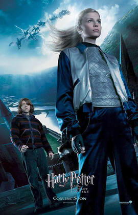 HARRY POTTER AND THE GOBLET OF FIRE RUPERT GRINT as Ron Weasley, CLEMENCE POESY as Fleur Delacour Date: 2005. Strictly editorial use only in conjunction with the promotion of the film. Credit line mandatory. This image is copyright of the film company and is supplied under the terms of issue as film still. No commercial or book cover use permitted without prior consent from the film company. Mandatory credit line: Image courtesy WARNER BROS & J K ROWLING Ronald Grant Archive Mary Evans