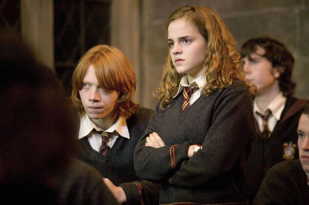 HARRY POTTER AND THE GOBLET OF FIRE RUPERT GRINT as Ron Weasley and EMMA WATSON as Hermione Granger PHOTOGRAPHS TO BE USED SOLELY FOR ADVERTISING, PROMOTION, PUBLICITY OR REVIEWS OF THIS SPECIFIC MOTION PICTURE AND TO REMAIN THE PROPERTY OF THE STUDIO. NOT FOR SALE OR REDISTRIBUTION Date: 2005. Strictly editorial use only in conjunction with the promotion of the film. Credit line mandatory. This image is copyright of the film company and is supplied under the terms of issue as film still. No commercial or book cover use permitted without prior consent from the film company. Mandatory credit line: Image courtesy WARNER BROS & J K ROWLING ?2004 Warner Bros. Entertainment R