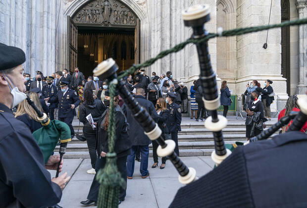 NYPD holds mass for members died of COVID-19 Family members and police officers leave cathedral after NYPD holds mass honoring members died of COVID-19 at St. Patrick s Cathedral. 46 members of NYPD Died during pandemic so far and many of them did not receive proper funeral due to pandemic restrictions. Almost 20% of NYPD members were sick with coronavirus during pick of pandemic in the city. Cardinal Timothy Dolan lead the mass. Mayor Bill de Blasio and Police commissioner Dermot Shea speak. New York New York United States Copyright: LevxRadin