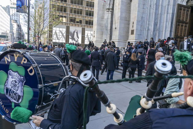 NYPD holds mass for members died of COVID-19 Family members and police officers leave cathedral after NYPD holds mass honoring members died of COVID-19 at St. Patrick s Cathedral. 46 members of NYPD Died during pandemic so far and many of them did not receive proper funeral due to pandemic restrictions. Almost 20% of NYPD members were sick with coronavirus during pick of pandemic in the city. Cardinal Timothy Dolan lead the mass. Mayor Bill de Blasio and Police commissioner Dermot Shea speak. New York New York United States Copyright: LevxRadin