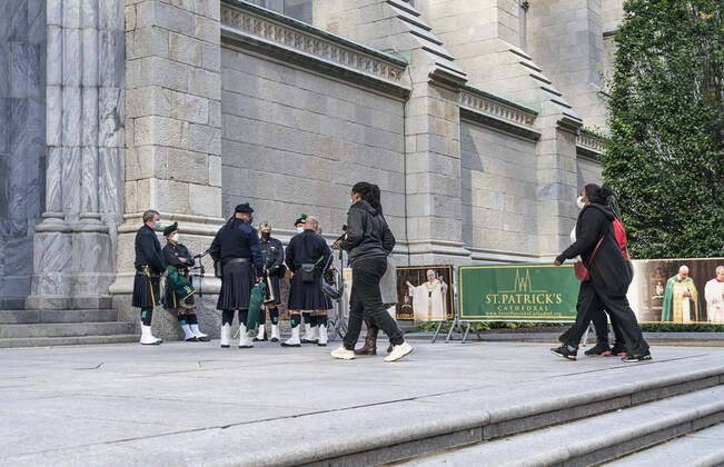 NYPD holds mass for members died of COVID-19 Family members arrive for NYPD mass honoring members died of COVID-19 at St. Patrick s Cathedral. 46 members of NYPD Died during pandemic so far and many of them did not receive proper funeral due to pandemic restrictions. Almost 20% of NYPD members were sick with coronavirus during pick of pandemic in the city. Cardinal Timothy Dolan lead the mass. Mayor Bill de Blasio and Police commissioner Dermot Shea speak. New York New York United States Copyright: LevxRadin
