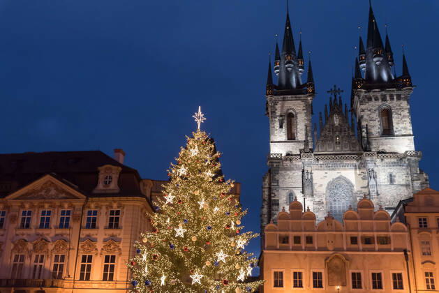 November 29, 2020, Prague, Czech Republic: Illuminated Christmas tree seen at the Old town square in Prague..Christmas tree was lit up at the Old town square (Staromestske namesti) in Prague during first Advent weekend. Famous Christmas market was cancelled due to the Coronavirus pandemic and current restriction in the Czech Republic. Prague Czech Republic - ZUMAs197 20201129_zab_s197_032 Copyright: xTomasxTkacikx