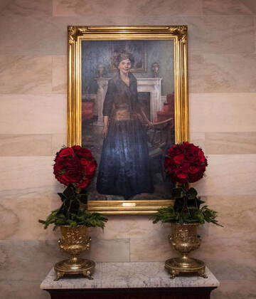 Christmas decorations are seen alongside a portrait of former First Lady Laura Bush in the White House in Washington, DC on Monday, November 30, 2020. This year s theme is, America the Beautiful and is a tribute to the natural wonders of the country.  WAP20201130308 KEVINxDIETSCH