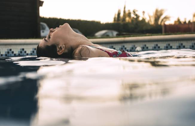 Beautiful woman in pool, Model released, Property released Copyright: xEduardoxHuelinx MR