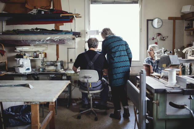 Male and female senior owners discussing while working at workshop , model released, property released Copyright: xMaskotx , MA61371