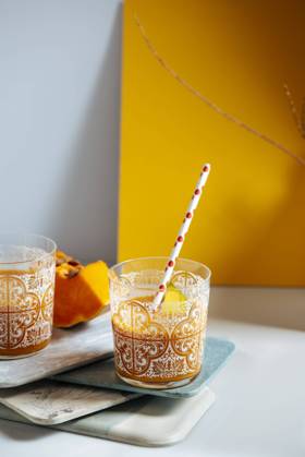 Mango and pumping smoothie on a glass. Surrounded by fruits and vegetables, healthy life concept, Model released, Property released Copyright: xJayxMidx MR