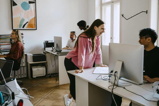 Male and female coworkers working in office Germany, Berlin, model released, property released Copyright: xMaskotx , MA83494