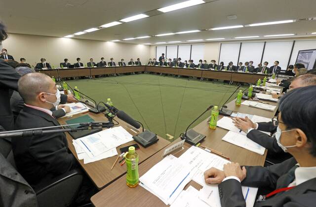 Anti-virus meeting Medical experts discuss anti-coronavirus measures during a meeting at the health ministry in Tokyo on Jan. 6, 2021, as the government is poised to declare another state of emergency later in the week in Tokyo and three neighboring prefectures in view of the unabated uptrend in virus infections. 