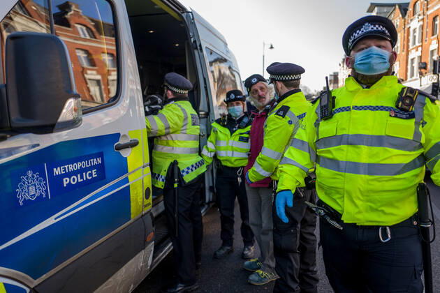 January 9, 2021, London, UK: Man was arrested and taken to a police van in Clapham Common London UK - ZUMAg173 20210109_zap_g173_004 Copyright: xVelarxGrantx