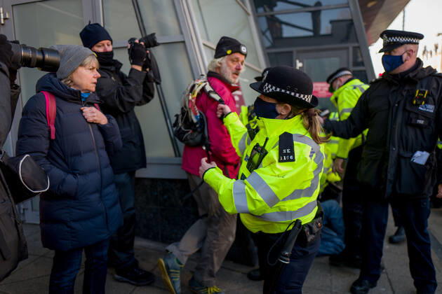 January 9, 2021, London, UK: Metropolitan police officers swarmed Clapham Common in on Saturday after anti-lockdown protesters gathered in the area. Group of demonstrators chanting â€oetake your freedom back†walked along the high street. Few demonstrators was arrested by Metropolitan Police officers. England s third national lockdown has legally come into force last week. The lockdown means people are able to leave their homes for limited reasons, with measures expected to stay in place until mid-February. London UK - ZUMAg173 20210109_zap_g173_007 Copyright: xVelarxGrantx