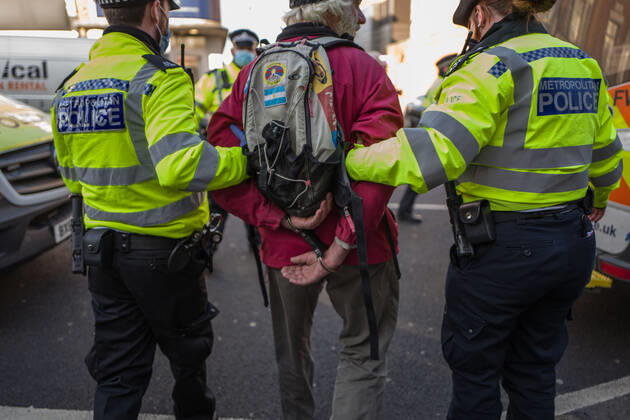 January 9, 2021, London, UK: Man was arrested and taken to a police van in Clapham Common London UK - ZUMAg173 20210109_zap_g173_008 Copyright: xVelarxGrantx