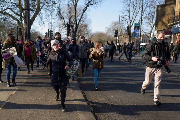 January 9, 2021, London, UK: Metropolitan police officers swarmed Clapham Common in on Saturday after anti-lockdown protesters gathered in the area. Group of demonstrators chanting â€oetake your freedom back†walked along the high street. Few demonstrators was arrested by Metropolitan Police officers. England s third national lockdown has legally come into force last week. The lockdown means people are able to leave their homes for limited reasons, with measures expected to stay in place until mid-February. London UK - ZUMAg173 20210109_zap_g173_009 Copyright: xVelarxGrantx