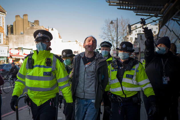 January 9, 2021, London, UK: Man was arrested and taken to a police van in Clapham Common London UK - ZUMAg173 20210109_zap_g173_010 Copyright: xVelarxGrantx
