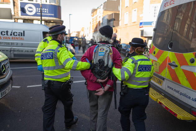 January 9, 2021, London, UK: Man was arrested and taken to a police van in Clapham Common London UK - ZUMAg173 20210109_zap_g173_011 Copyright: xVelarxGrantx