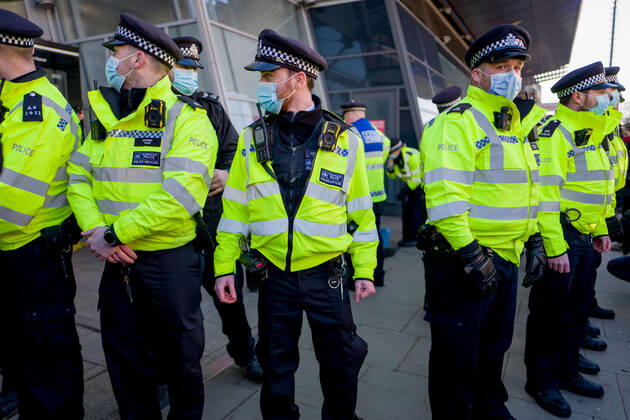 January 9, 2021, London, UK: Metropolitan police officers swarmed Clapham Common in on Saturday after anti-lockdown protesters gathered in the area. Group of demonstrators chanting â€oetake your freedom back†walked along the high street. Few demonstrators was arrested by Metropolitan Police officers. England s third national lockdown has legally come into force last week. The lockdown means people are able to leave their homes for limited reasons, with measures expected to stay in place until mid-February. London UK - ZUMAg173 20210109_zap_g173_015 Copyright: xVelarxGrantx