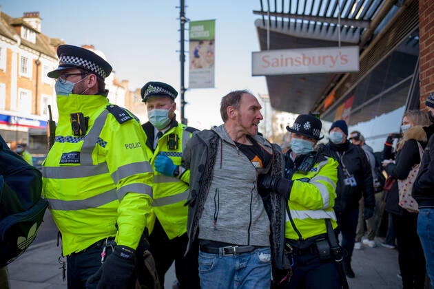January 9, 2021, London, UK: Man was arrested and taken to a police van in Clapham Common London UK - ZUMAg173 20210109_zap_g173_016 Copyright: xVelarxGrantx