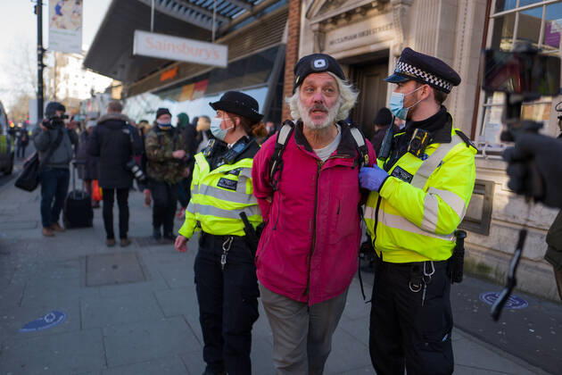 January 9, 2021, London, UK: Man was arrested and taken to a police van in Clapham Common London UK - ZUMAg173 20210109_zap_g173_019 Copyright: xVelarxGrantx