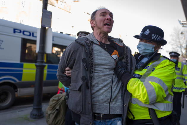 January 9, 2021, London, UK: Man was arrested and taken to a police van in Clapham Common London UK - ZUMAg173 20210109_zap_g173_021 Copyright: xVelarxGrantx