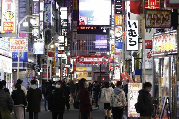 January 10, 2021, Tokyo, Japan: People wearing face masks leave Kabukicho (the red-light district of Tokyo) after the establishments closed at 8 pm to stop the COVID-19 infections in the capital. Tokyo reported 1,494 new COVID-19 cases on January 10; following four days of over 2,000 cases, the daily infections count dropped for the first time after the state of emergency was declared in Tokyo, Kanagawa, Saitama, and Chiba prefectures. Tokyo Japan - ZUMAm191 20210110_zap_m191_019 Copyright: xRodrigoxReyesxMarinx