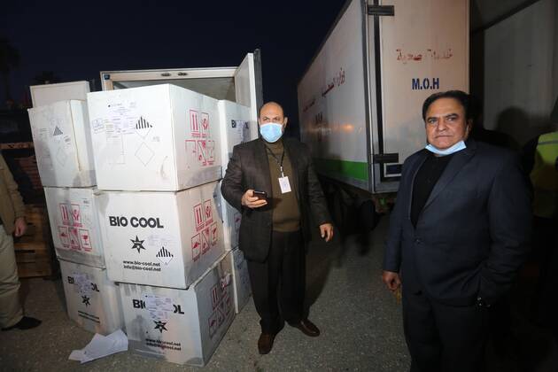 January 10, 2021, Rafah, Gaza Strip, Palestinian Territory: Palestinians receive medical aid from the United Arab Emirate, in Rafah border crossing in the southern of Gaza Strip, on January 10, 2021. The second shipment of Emirati medical aid arrived in the Gaza Strip this evening, which includes medical aid provided to the Ministry of Health in the Gaza Strip, to enhance health efforts in the face of the Corona pandemic, including an oxygen production plant with all its accessories, respirators and other medical equipment Rafah Palestinian Territory - ZUMAap3_ 20210110_zaf_ap3_100 Copyright: xAshrafxAmrax