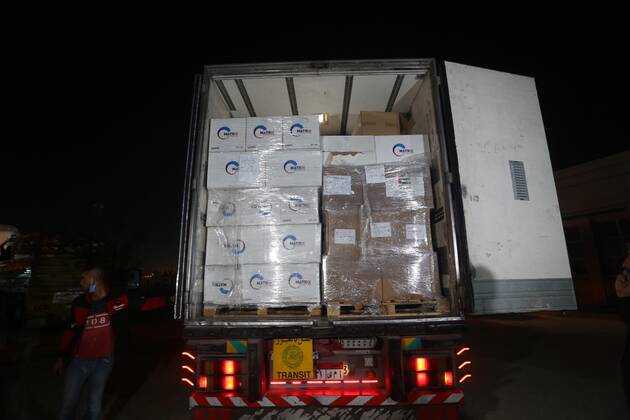 January 10, 2021, Rafah, Gaza Strip, Palestinian Territory: Palestinians receive medical aid from the United Arab Emirate, in Rafah border crossing in the southern of Gaza Strip, on January 10, 2021. The second shipment of Emirati medical aid arrived in the Gaza Strip this evening, which includes medical aid provided to the Ministry of Health in the Gaza Strip, to enhance health efforts in the face of the Corona pandemic, including an oxygen production plant with all its accessories, respirators and other medical equipment Rafah Palestinian Territory - ZUMAap3_ 20210110_zaf_ap3_105 Copyright: xAshrafxAmrax