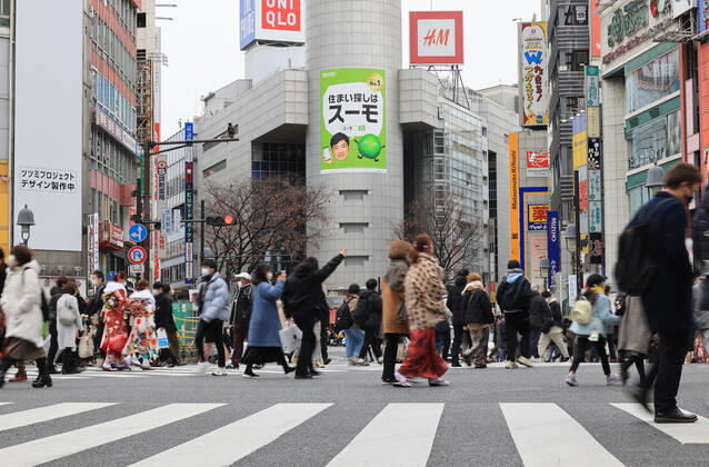 January 11, 2021, Tokyo, Japan -People cross a road at Shibuya fashion district amid outbreak of the new coronavirus in Tokyo on Monay, January 11, 2021 on a national holiday, Coming-of-Age Day. Prime Minister Yoshihide Suga declared a state of emergency on Tokyo and three neighboring prefectures. (151812245)