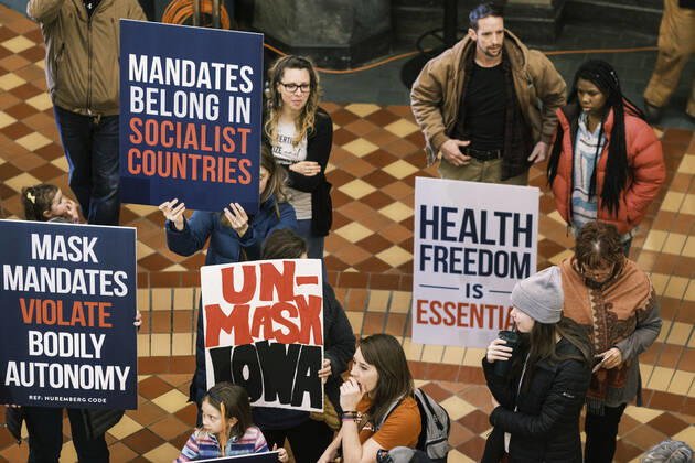 January 11, 2021, Des Moines, Iowa, U.S: People gather in the Rotunda of the Iowa State Capitol in Des Moines. Hundreds of Iowans from across the state came to the State Capitol to protest the Governor s COVID-19 mitigation efforts. The Coronavirus (SARS-CoV-2) mitigation guidelines include a mask mandate indoors when it isn t possible to social distance. But the Governor specifically exempted the State Capitol. No one in the crowd wore a mask and there was no effort to follow social distancing guidelines. There were also anti-Vaxxers in the crowd who protested the vaccine efforts and said vaccines were unsafe. Des Moines U.S. - ZUMAk94_ 20210111_zaf_k94_001 Copyright: xJackxKurtzx