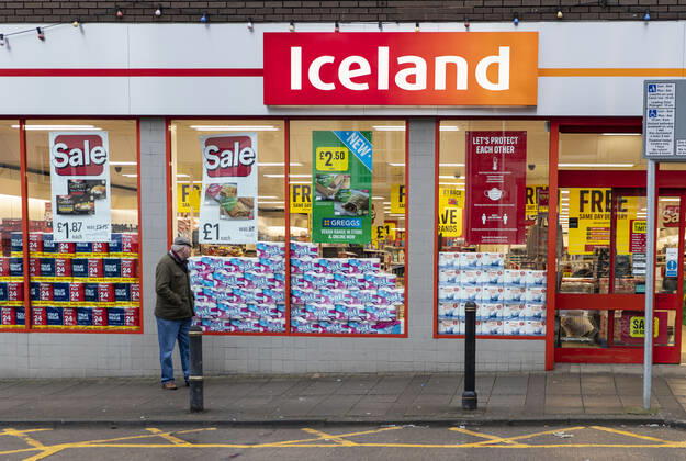 January 11, 2021, Newport, Wales, United Kingdom: A man walks past the Iceland supermarket in Wales. Newport United Kingdom - ZUMAs197 20210111_zab_s197_011 Copyright: xMayxJamesx