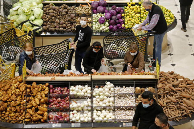 (210112) -- BEIRUT, Jan. 12, 2021 -- People shop at a supermarket to prepare for a national COVID-19 lockdown in Beirut, Lebanon, Jan. 11, 2021. Lebanon s Higher Defense Council declared on Monday a state of emergency between Jan. 14-25 that includes a total lockdown in hope to restrict further spread of COVID-19, Al-Jadeed local TV channel reported. ) LEBANON-BEIRUT-COVID-19-LOCKDOWN BilalxJawich 