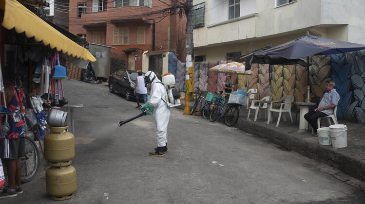 January 12, 2021, Rio De Janeiro, Rio de Janeiro, Brazil: DECEMBER 12 - avela Santa Marta residents clean the Favela, the number of deaths in this community has increased by more than 70%, in less than 15 days, Brazil reaches 201,460 deaths in 8,013,708 confirmed cases, updated the daily figures on the new pandemic coronavirus in Brazil. According to the latest data, the country exceeds the mark of 8 million infected due to the disease and now has 8,013,708 confirmed cases and 201,460 deaths by Covid-19.....In the last 24 hours alone, a further 52,035 were infected and 962 deaths from the disease were included. The lethality rate across the country at this time remains at 2.5%.............,........................,................, ....... - ZUMAt142 20210112_zap_t142_005 Copyright: xFabioxTeixeirax