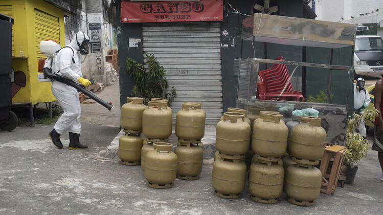 January 12, 2021, Rio De Janeiro, Rio de Janeiro, Brazil: DECEMBER 12 - avela Santa Marta residents clean the Favela, the number of deaths in this community has increased by more than 70%, in less than 15 days, Brazil reaches 201,460 deaths in 8,013,708 confirmed cases, updated the daily figures on the new pandemic coronavirus in Brazil. According to the latest data, the country exceeds the mark of 8 million infected due to the disease and now has 8,013,708 confirmed cases and 201,460 deaths by Covid-19.....In the last 24 hours alone, a further 52,035 were infected and 962 deaths from the disease were included. The lethality rate across the country at this time remains at 2.5%.............,........................,................, ....... - ZUMAt142 20210112_zap_t142_006 Copyright: xFabioxTeixeirax